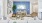 a living room with a blue wall a tv and couch