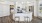 a kitchen with white cabinets and a kitchen island with a granite countertop